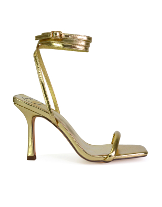 gold stilettos