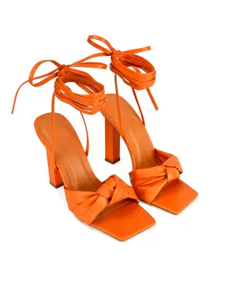 Evelyn Knot Detail Strappy Lace Up Square Toe Block High Heel Sandals in Orange Synthetic Leather is $37.99 (36% off)