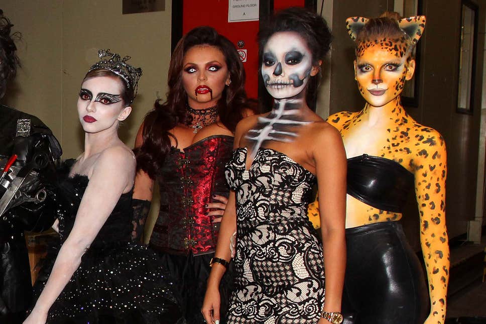 Girl band Little Mix in Halloween fancy dress costumes