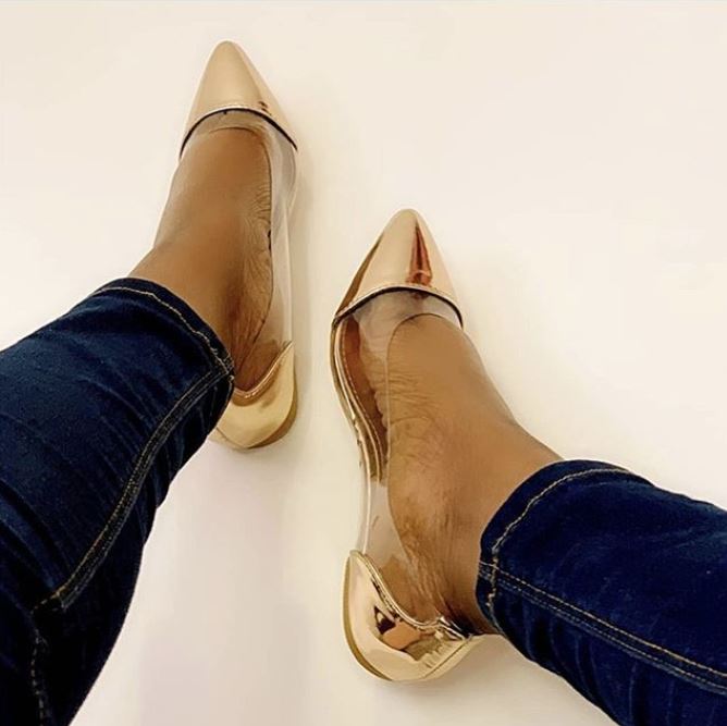 Influencer wearing XY London Tamera Pointed Toe Perspex Pumps in rose gold colour 